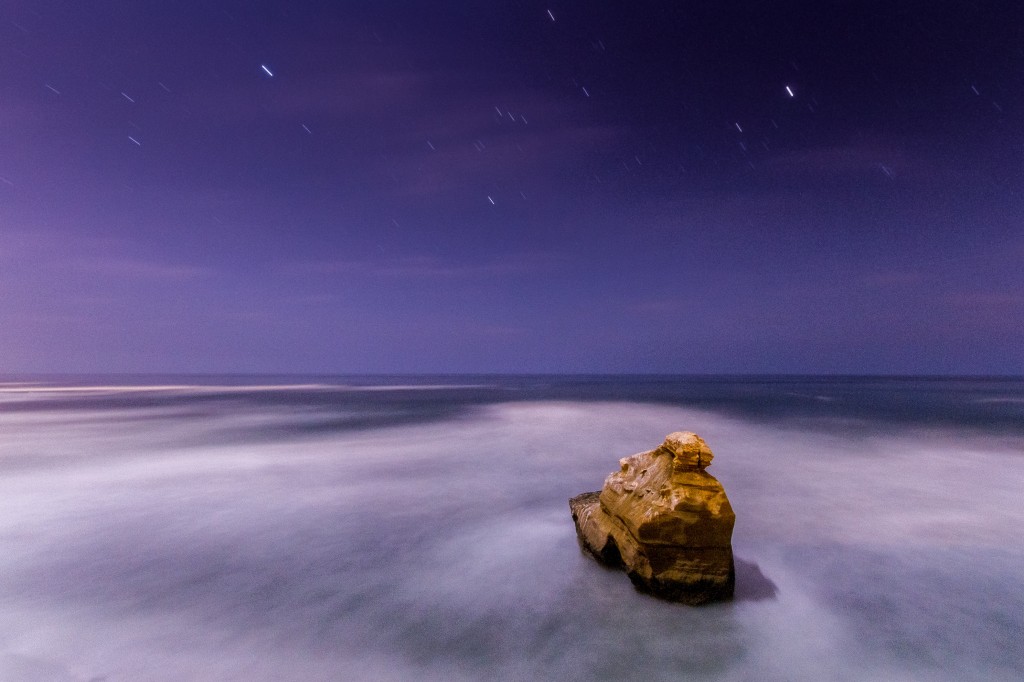 Long exposure of a rock lit by  Moonlight